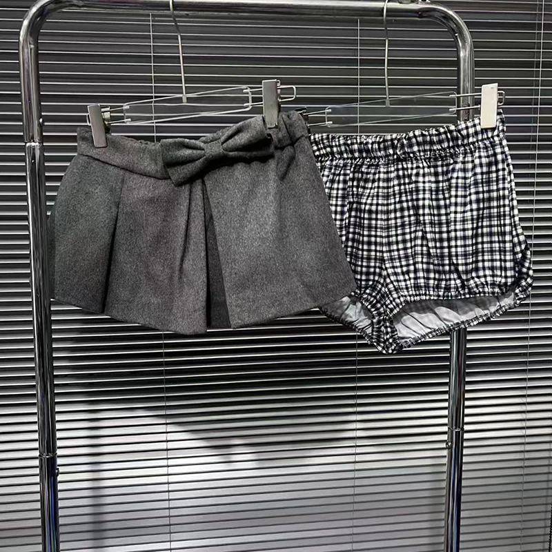 KBQ أنيقة أنيقة تقسم Bowknots ألف خط التنانير للنساء عالية الخصر مزاجه طيات التنانير الصغيرة الإناث موضة الخريف نمط