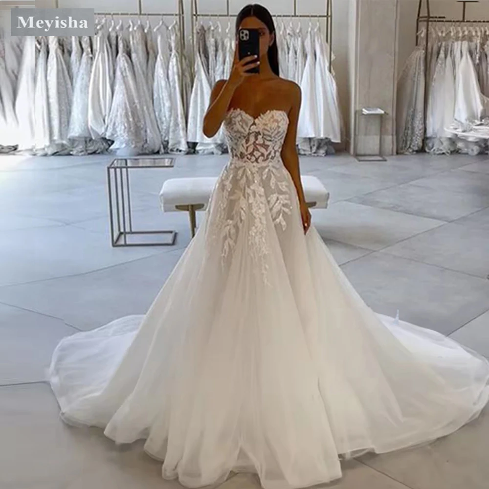 

Customized ZJ9389 Customized Backless Mermaid Bride Dresses with Long Lace Tail Spaghetti Straps Slim Fitting Sexy Wedding Dress