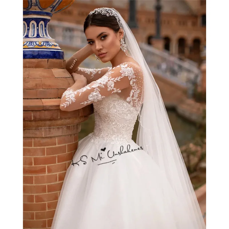 2024 Elegant Ball Gown Wedding Dresses O Neck Long Sleeve Beads Lace Bridal Dress Princess Church Wedding Gowns Illusion