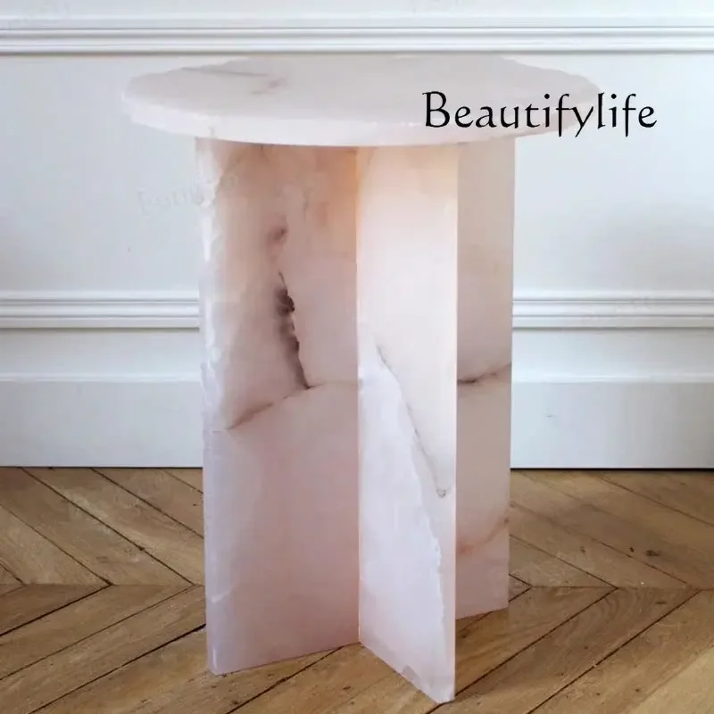 

Light luxury Brazilian pink jade edge few natural powder crystal round living room sofa round mobile small coffee table