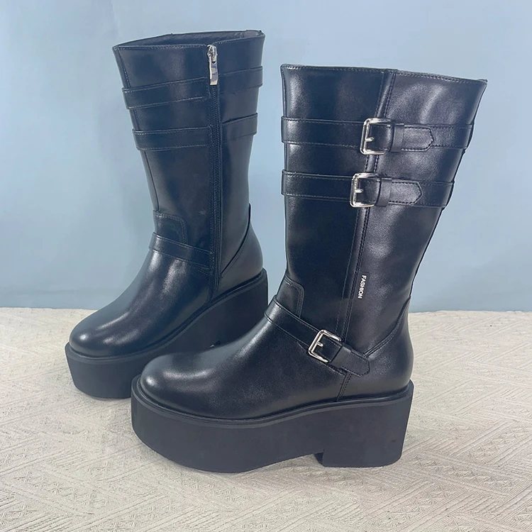 

Женские сапоги до колена на массивном каблуке. Модные кожаные сапоги с ремешками-пряжками. Каблук 7 см для дополнения высоты. Осень-зима.