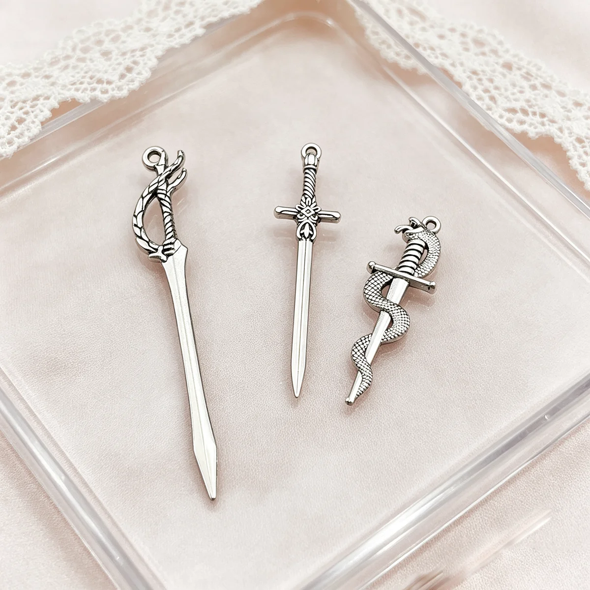 15-Piece Set of Snake-Shaped Sword DIY Handmade Accessories, Including Coiled Snake Cross Short Swords, Rope-Wrapped Long Swords, and Floral Guard Short Swords in Various Designs, Suitable for DIY Bracelets, Necklaces, Earrings, Pendants, and Handmade Beaded Decoration Accessories