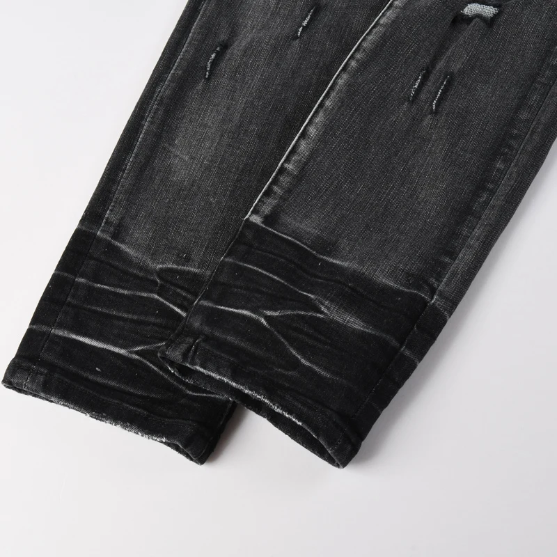Jeans Pria Baru Mode Musim Gugur Jeans Hitam Nostalgia Dicuci Tambalan Kulit Hitam Berlubang Jeans Elastis Merek Hip-Hop High Street