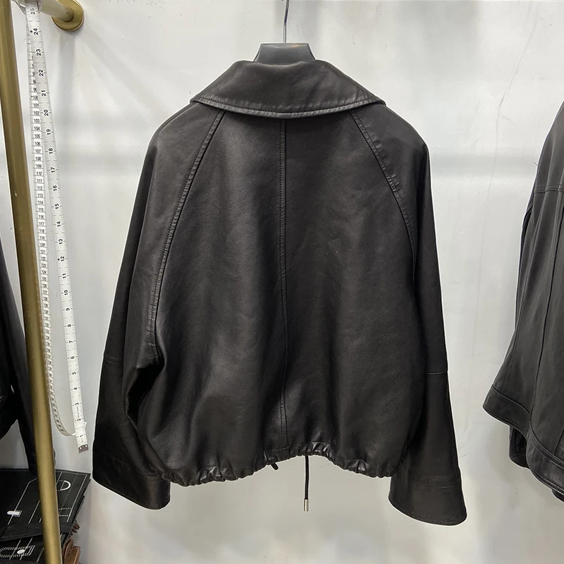 2025 ผู้หญิงฤดูใบไม้ผลิสายรัดสีดําหนังแกะแท้เสื้อแจ็คเก็ตฤดูใบไม้ร่วงหลวมจริงหนัง Overcoat