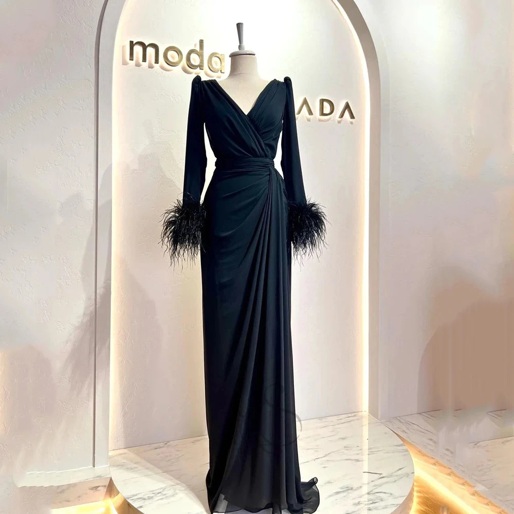 Elegant Black Gown with V-neck Long Sleeve Satin Ruffled Feathers and Floor-Length Evening Gown for Women فساتين للحفلات الراقصة