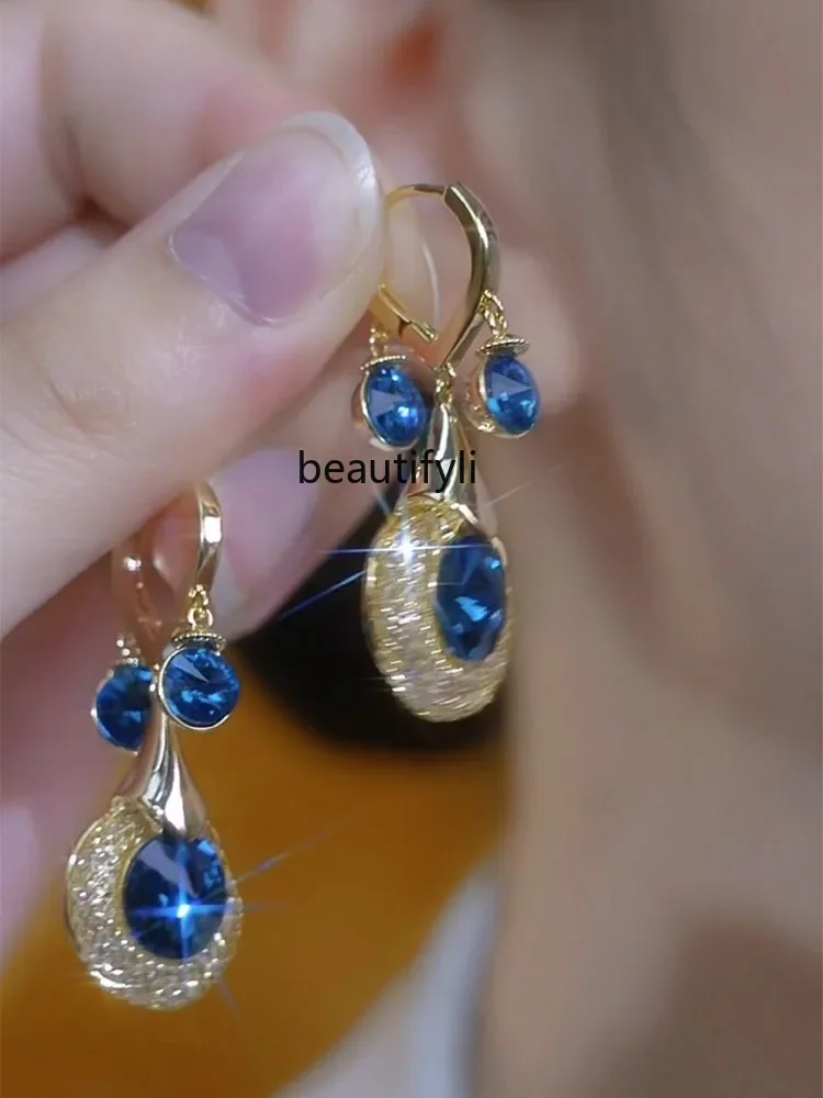 Light luxury high-end gold silk blue crystal earrings fashionable sterling silver needle earrings niche design ear buckles