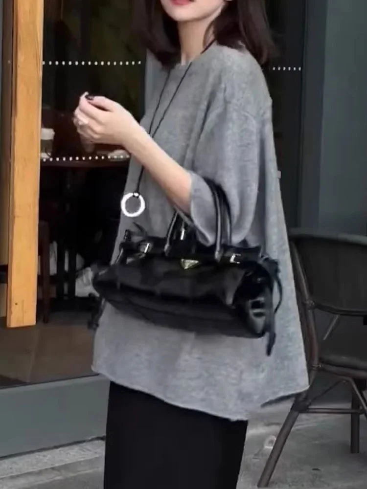 Schicke reine Farbstrickwaren, lockere Passform, koreanisches SLE-Sommer-Top, Fünfviertel-SVE-Design, lässige, faionable koreanische Version