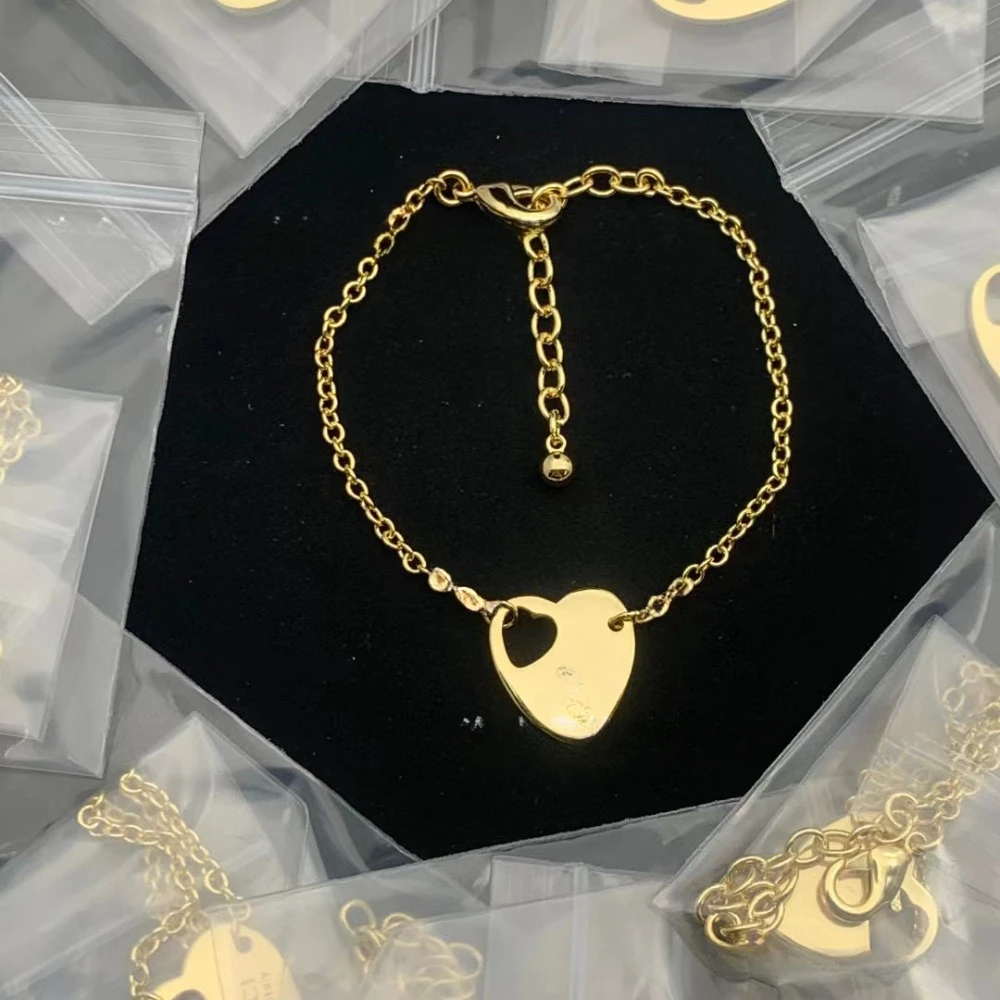 سوار G عالي الجودة - حرف حجر الراين اللامع القديم، سلسلة مكتنزة متعثرة وعنصر الكاميليا