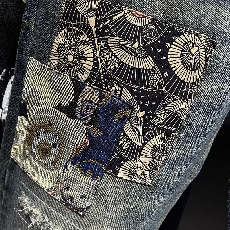 メンズ向けハイエンドダメージパッチ生地ハーレムパンツ、頑丈でハンサムなルーズストレートデニムパンツ、トレンドのテーパードパンツ、お父さん向け