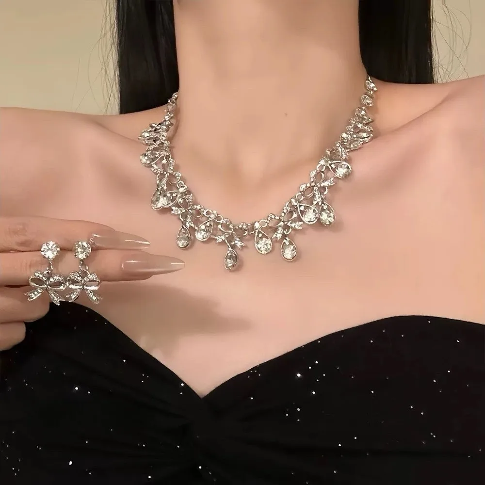 

2 pieces Water Drop Rhinestone Jewelry Set Bow Inlaid Necklace Earrings Set Luxury Exquisite Crystal Necklace Set Bridal