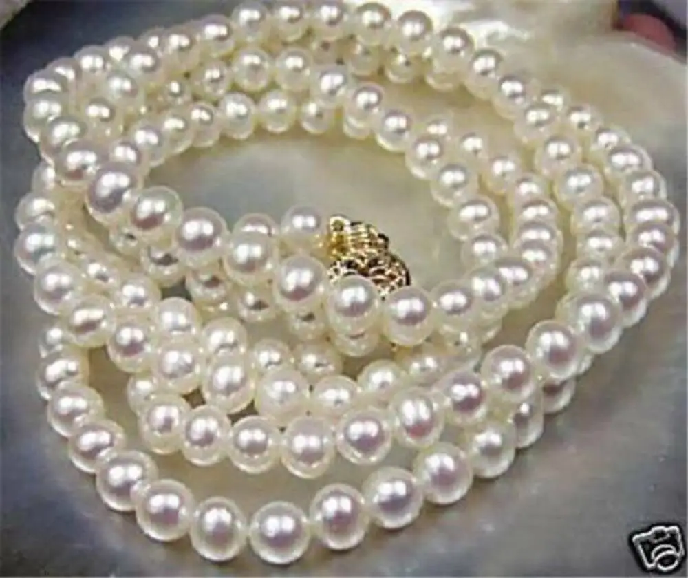 

Beautiful Natural 7-8mm White Freshwater Cultured Pearl Necklace 32"