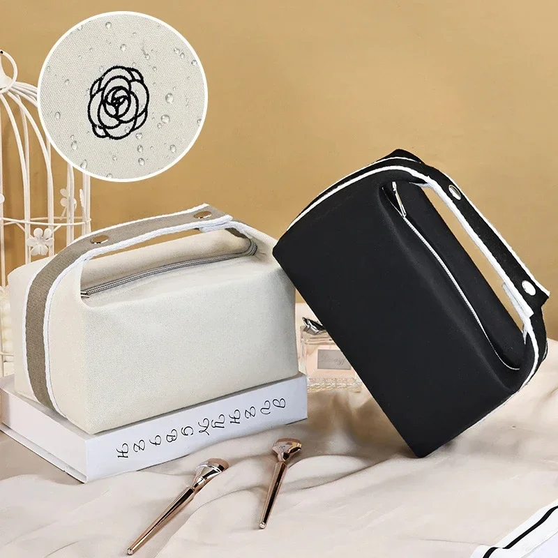 

Premium Handheld Portable Camellia Canvas Makeup Bag for Travel Large Capacity Toiletries Cosmetics Skincare Storage Bag