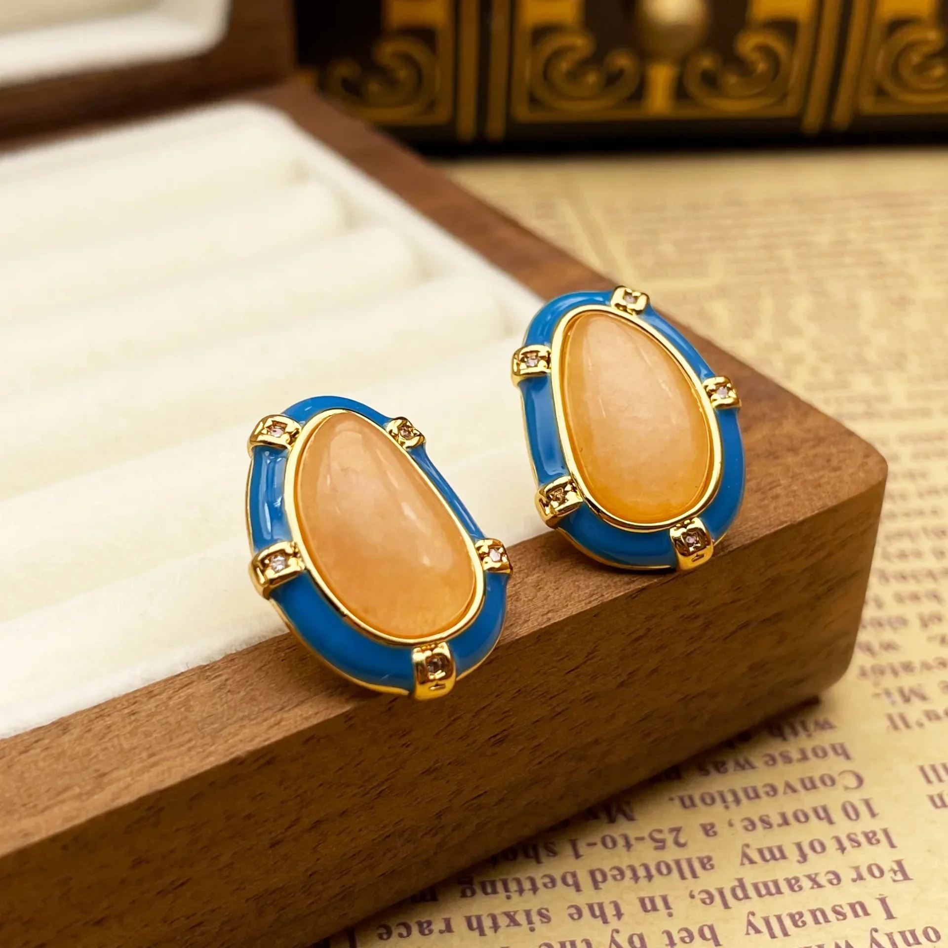 

Regular drop glaze inlaid stone high-end exaggerated stud earrings