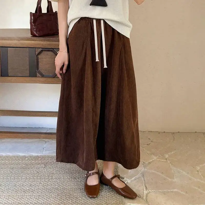 กระโปรงทรงเอ midi ผ้าลูกฟูกสไตล์วินเทจสำหรับผู้หญิง มีกระเป๋า ผูกเชือก ทรงยาว เหมาะสำหรับฤดูใบไม้ร่วงและฤดูหนาว สไตล์เกาหลี หนา