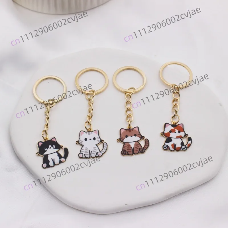Creative metal cat keychain, well-behaved flower cat keychain (random delivery)