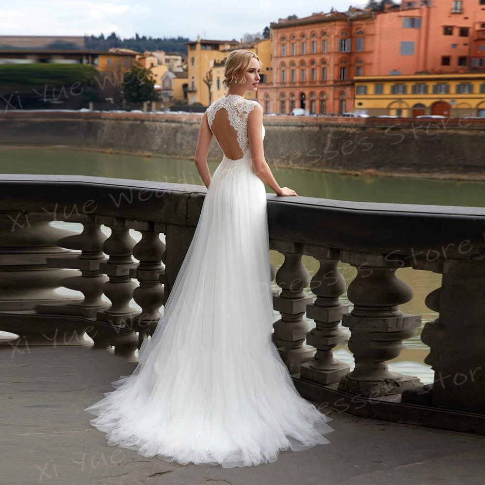 Generoso O collo una linea abiti da sposa da donna affascinanti Appliques di pizzo abiti da sposa classici senza maniche Backless Vestido De Noivas