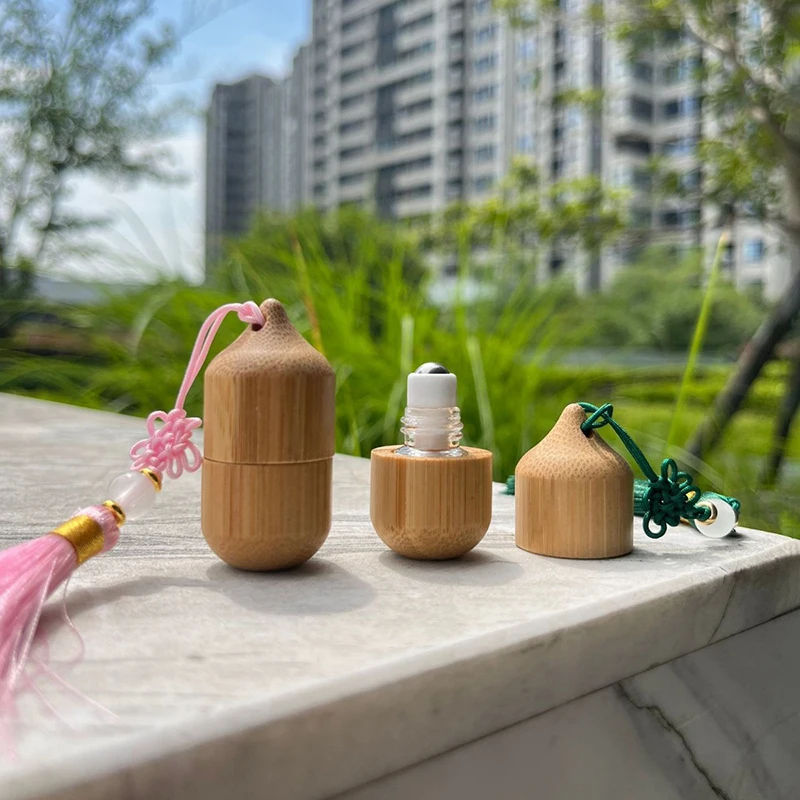 

1ML Bamboo Refillable Roll On Bottles For Essential Oils Cosmetic Perfume Steel Roller Bottle Mini Glass Tube Roll With Tassels