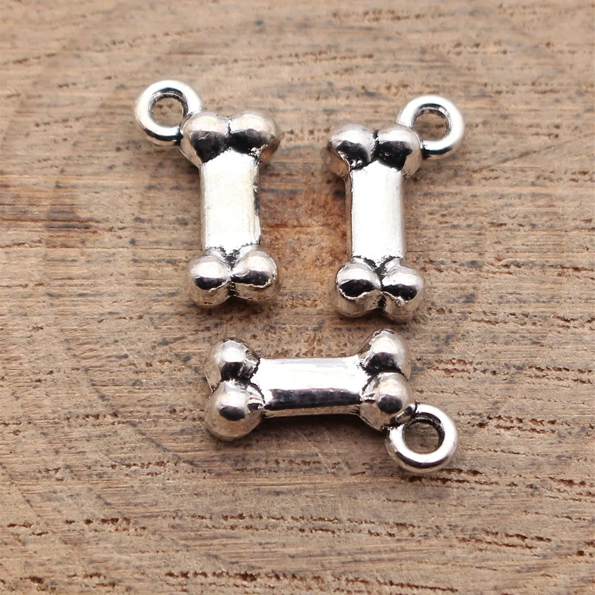 

40pcs 15x9x4.5mm(0.59x0.35x0.18inch) Antique Silver Color Bone Charms Pendants DIY Jewelry Making Accessories