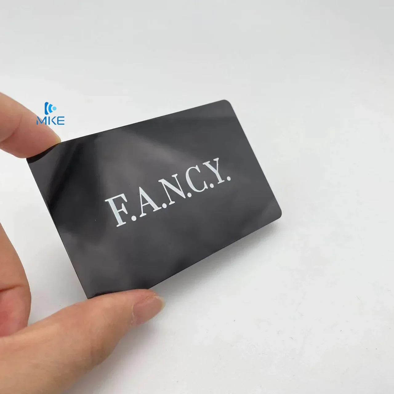 

Embossed Glossy Black Metal Visit Cards