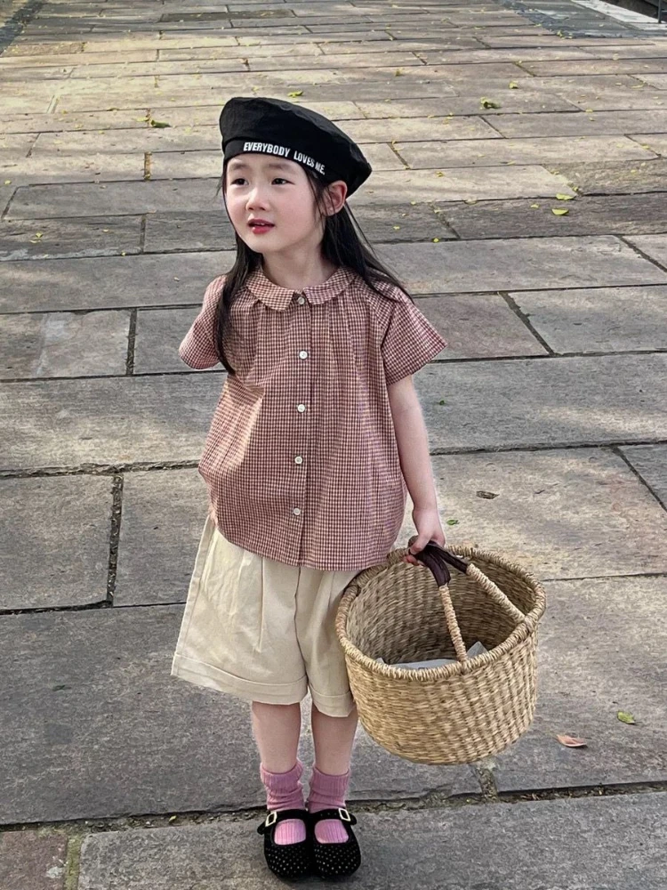 

Girls Korean Inspired Checkered Peter Pan Collar Blouse Summer 2026 Cute Baby Short Sleeve Top for Kids Stylish Toddler Shirt