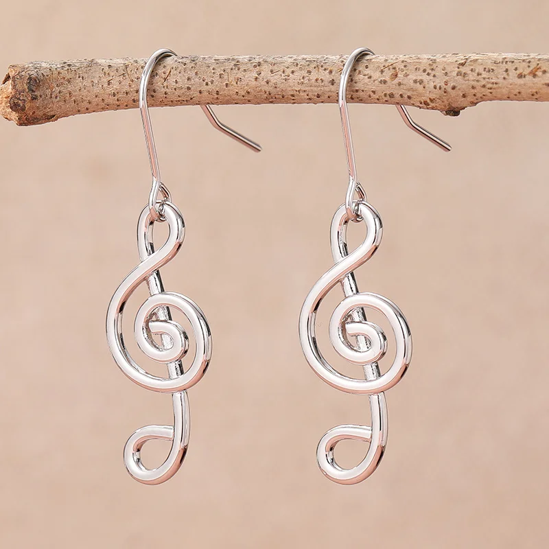 Kreative versilberte romantische Musiknoten-Tropfenohrringe für Frauen, Persönlichkeit, niedliche Alltags-Ohrringe, modischer Party- und Hochzeitsschmuck.