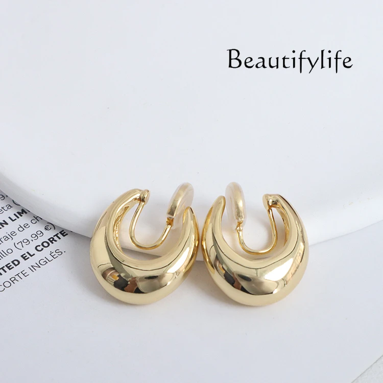 

Temperament circle ear clips without ear piercings, women's niche retro high-end mosquito coil disc earrings are unique