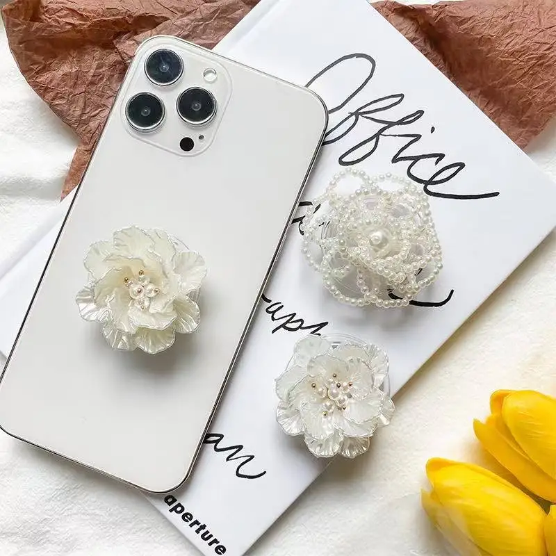 

Новая подставка для подушек безопасности Pearl Rose подходит для всех серий телефонов Apple и Samsung и любимых всех