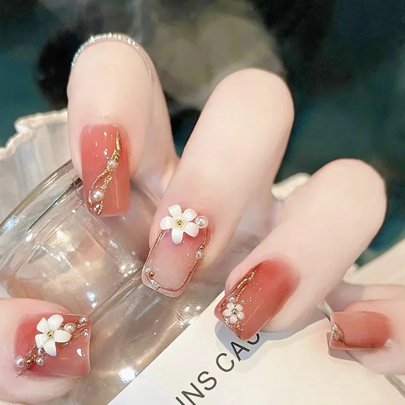 

24pcs Long Island Iced Tea Press-On Nails - 3D Camellia Embossed with Pearl Glitter Gold Powder Border Medium Square False Nails