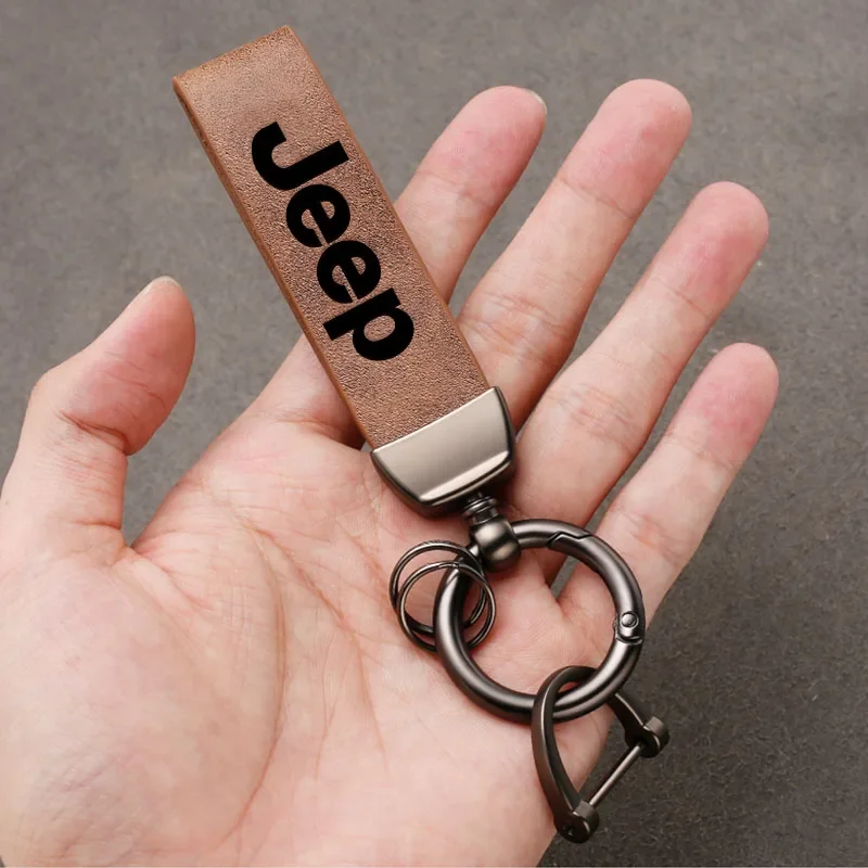 سلسلة مفاتيح جلدية عالية الجودة مع شعار سيارة كيرينغ اكسسوارات ل جيب جراند شيروكي رانجلر JK المصارع البوصلة رينيجيد بات