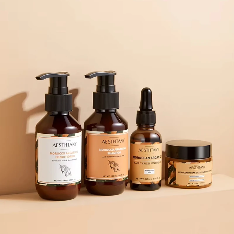Nuevo Set de Cuidado Capilar con Aceite de Argán Marroquí - Kit de Viaje 4 en 1 para Reparación y Brillo del Cabello Dañado, Incluye Champú, Acondicionador, Mascarilla y Aceite