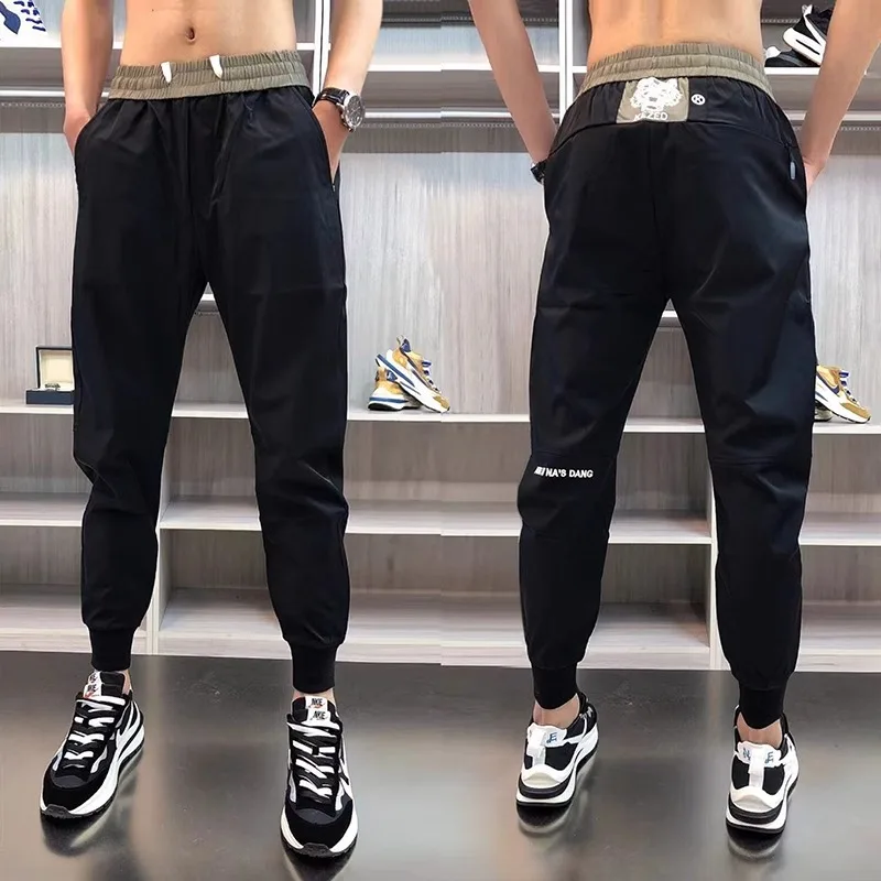 

Новые модные молодежные брюки-харлан 2026 года: облегающие, повседневные, с эластичными манжетами, с принтом «Голова тигра», универсальные, из полиэстера