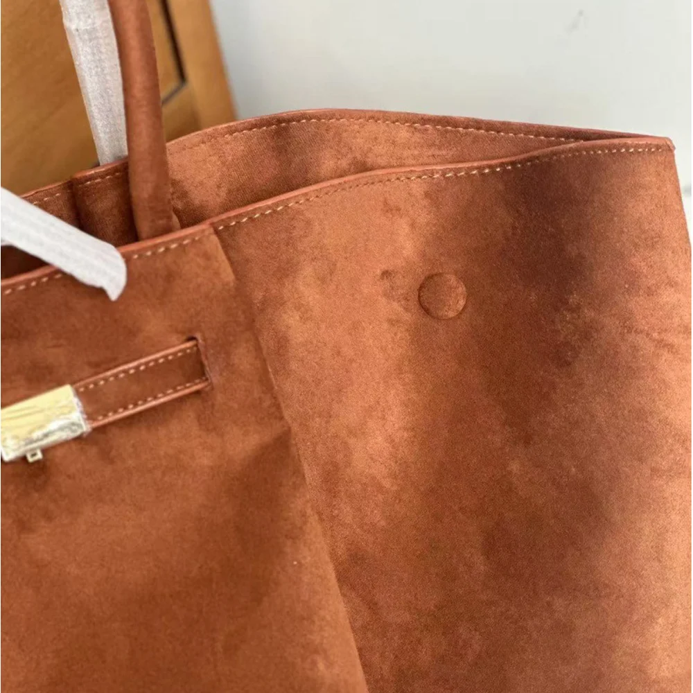 2025 New Suede Leather Wing Bun Fashion Dumpling Bun Handheld Large Capacity Tote Versatile New York Bag Storage Diagonal Span