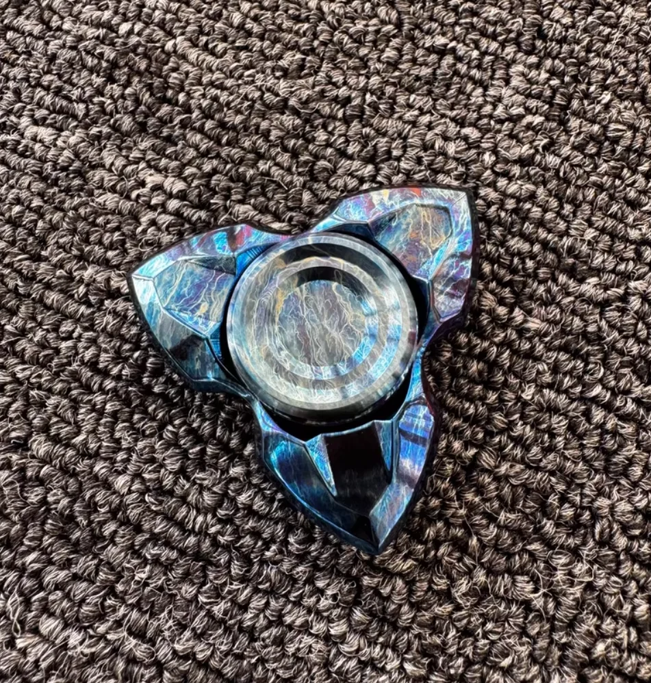 Used EDC Novo Storm Titanium Apache spinner fidget decompression toy