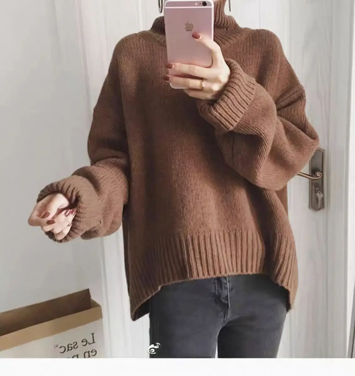 Autumn and winter women\'s casual solid color high neck long sleeved loose sweater