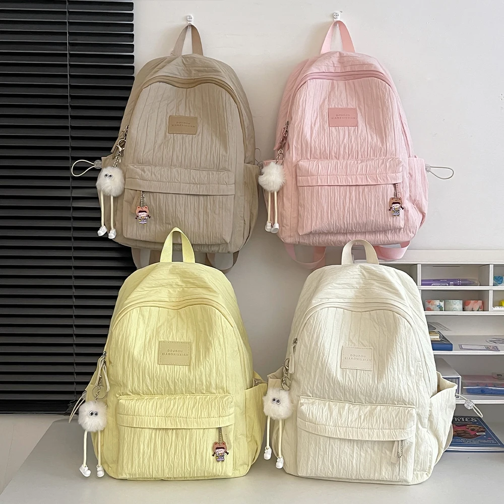 Lightweight schoolbag female college student niche design simple and versatile backpack primary and secondary school students casual travel backpack