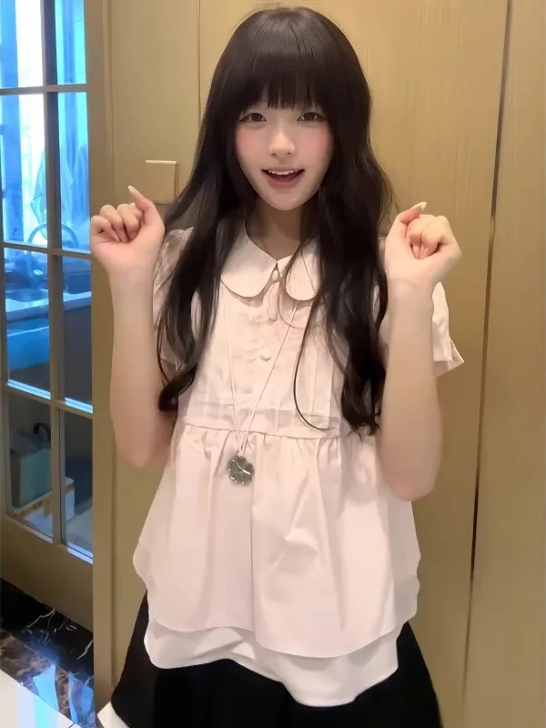 เสื้อคอตุ๊กตาทรงหลวมสไตล์เกาหลีหวานๆ สำหรับสาวอวบ แฟชั่นฤดูร้อนใหม่ เสื้อทรงหลวม ช่วยให้ดูผอมลง เหมาะสำหรับใส่ไปทำงานหรือวันสบายๆ