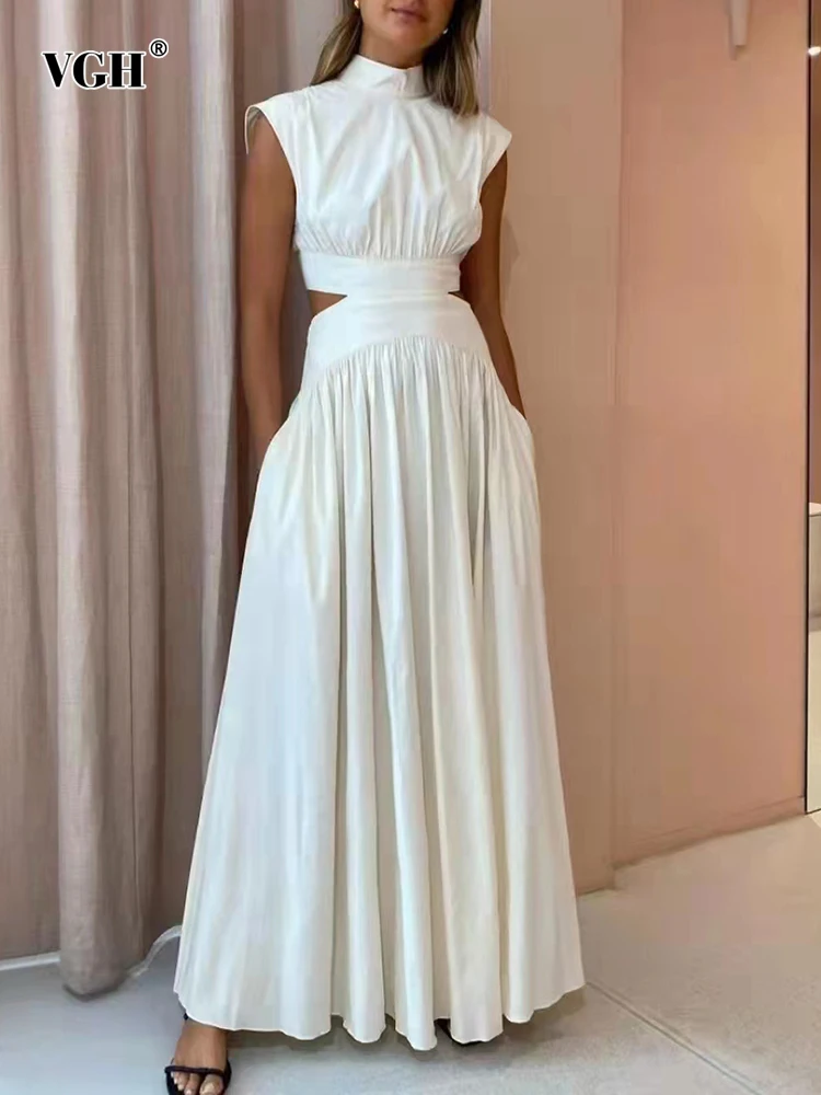 

VGH Minimalist Fashion Cut Out Dress For Women Stand Collar Sleeveless High Waist Solid Midi Dresses Female 2025 Summer Clothes