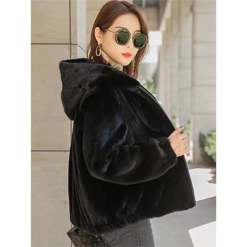 

A new short hooded light and trendy mixed fur coat for women