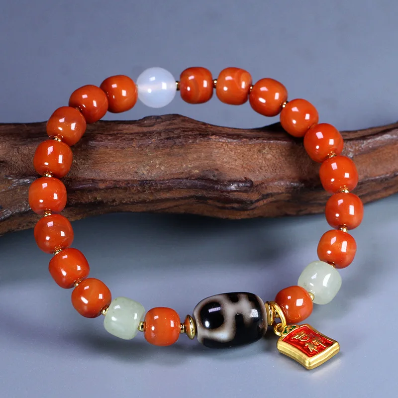 Tibetan natural old black gold treasure bottle dzi beads, South Red Agate and Hetian Jade bracelet, approximately 13x11mm