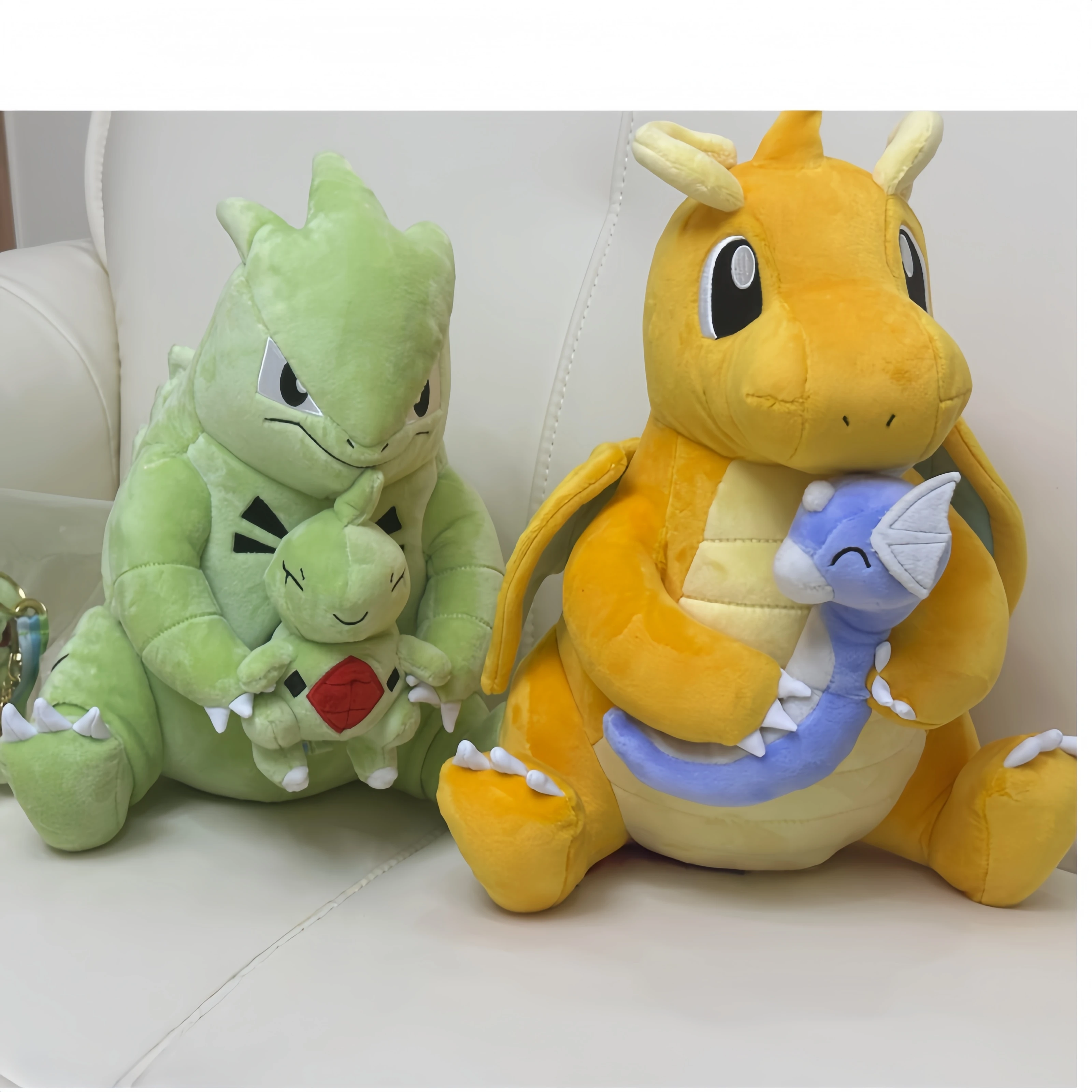 

Pikachu Plush Charizard Dragonite Holding Dratini Stuffed Doll Pokemon Peluches Tyranitar Cute version Anime Peluche Toys Gifts