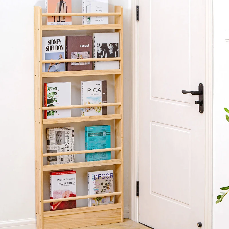 

Behind the door, there is a floor-to-floor multi-layer gap storage cabinet, solid wood children's picture book, thin bo