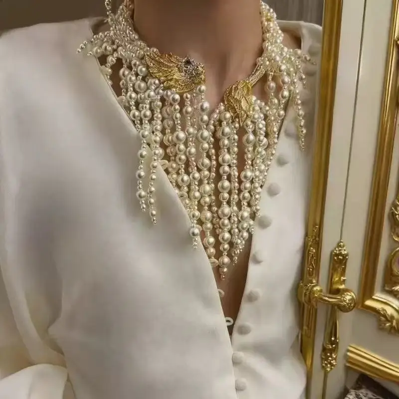 Hand-woven pearl tassel choker with embossed sparkling lion head necklace