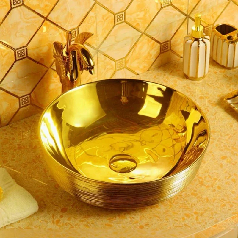 

New brushed gold washbasin household tyrant gold washbasin basin round european style retro art countertop basin