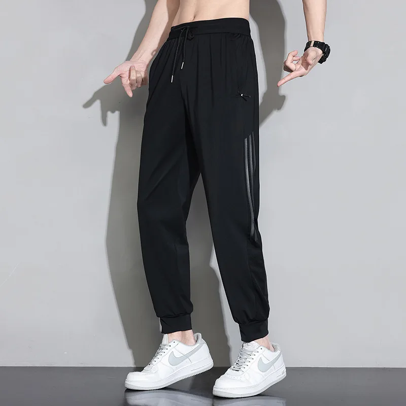 Calça masculina casual em pedaços de gelo, estilo fino, secagem rápida, pés soltos, rua, cor sólida, acessível, verão, 2022