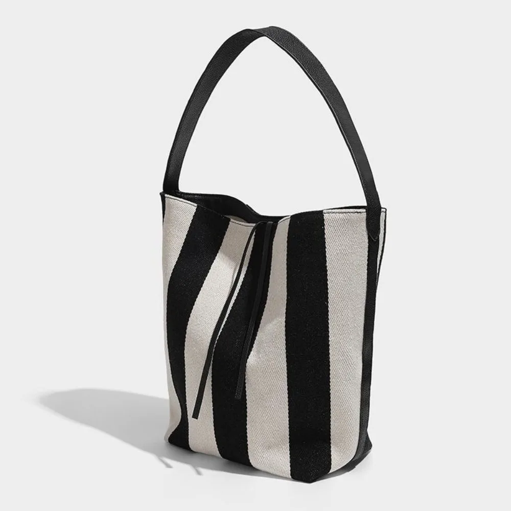 

Large Capacity Black White Stripe Bag Pattern Drawstring Stripe Canvas Handbag Simple Magnetic Buckle Wide Straps Bucket Bag