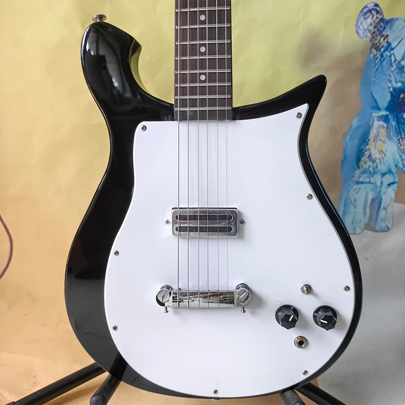 Black Irregular Solid Body Electric Guitar, Dual Humbuckers, Yellow Pickguard, 6-String Electric Guitar. Vintage & Unique Styling, Perfect for Beginner Practice and Rock Stage Performance.