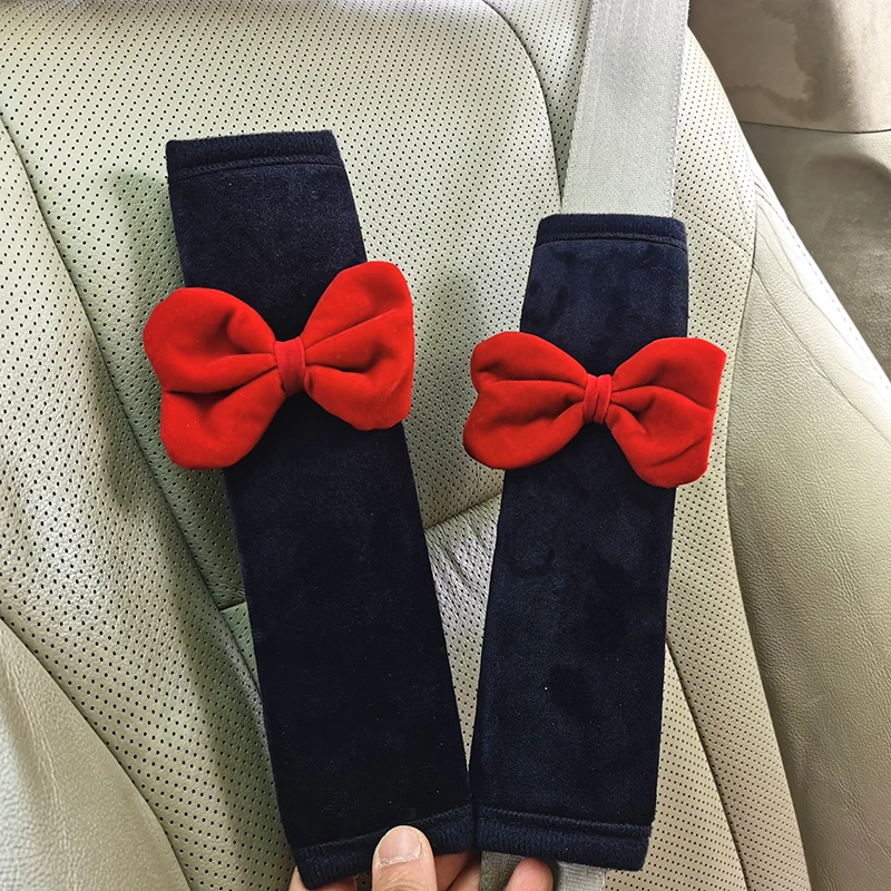 ที่หุ้มสายเข็มขัดนิรภัยรถยนต์ลายโบว์น่ารัก 2 ชิ้น ป้องกันการรัดคอ อุปกรณ์ตกแต่งภายในรถยนต์ ของขวัญสำหรับสาวๆ