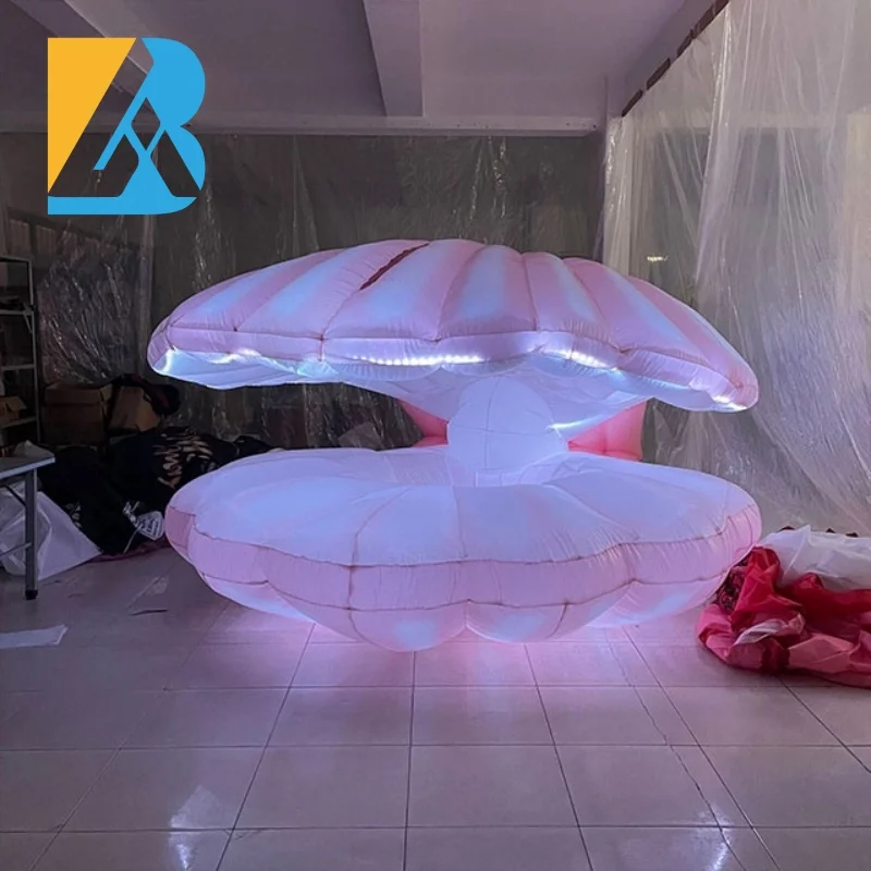 La grande festa a tema Royal Ball personalizzata illumina il guscio gonfiabile del mare per i giocattoli decorativi dell'ingresso sul palco
