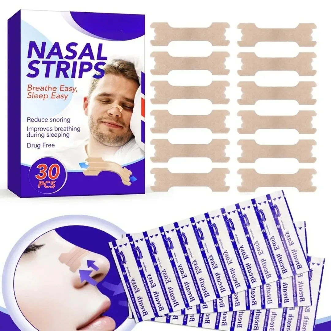 แผ่นแปะจมูกช่วยลดการนอนกรน Breath Right บรรจุกล่อง 30 ชิ้น ช่วยให้หายใจสะดวกขึ้น นอนหลับสบายขึ้น เหมาะสำหรับผู้ใหญ่