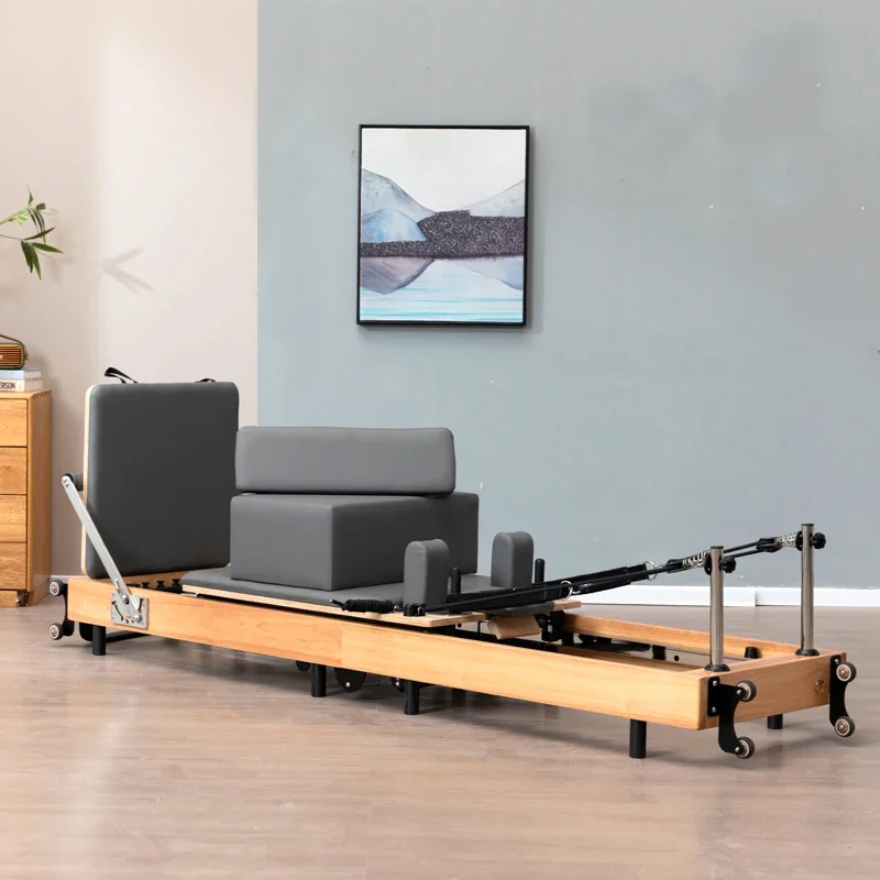 مصلح بيلاتيس عالي الجودة من خشب البلوط قابل للطي سريع الطي لليوجا معدات لياقة بدنية كبيرة سرير بيالتيس منزلي تجاري